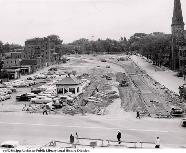 The Plymouth Avenue South section of the Inner Loop under construction. First Presbyterian Church, corner of Spring Street, at right. The Standish (apartment house) in background, left of center. Monument to Fox Sisters and beginnings of Spiritualism in background. 1953-1958 - PHOTO COURTESY OF THE LOCAL HISTORY & GENEOLOGY DIVISION, ROCHESTER PUBLIC LIBRARY