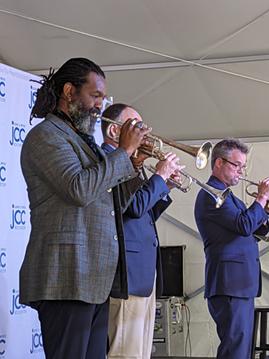 RPO trumpeters Herb Smith, Wesley Nance, and Douglas Prosser perform at the launch of the Dawn Lipson Canalside Stage at the JCC of Greater Rochester on June 2, 2021. - PHOTO BY DANIEL J. KUSHNER