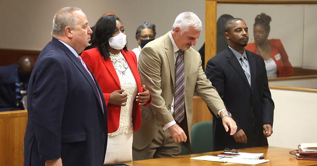 Rochester Mayor Lovely Warren with her attorney Joseph Damelio, left, and her husband Timothy Granison, far right, with his attorney, John DeMarco, pleaded not guilty to gun and child endangerment charges in Monroe County Court on July 21, 2021. - COURT POOL PHOTO / DEMOCRAT AND CHRONICLE