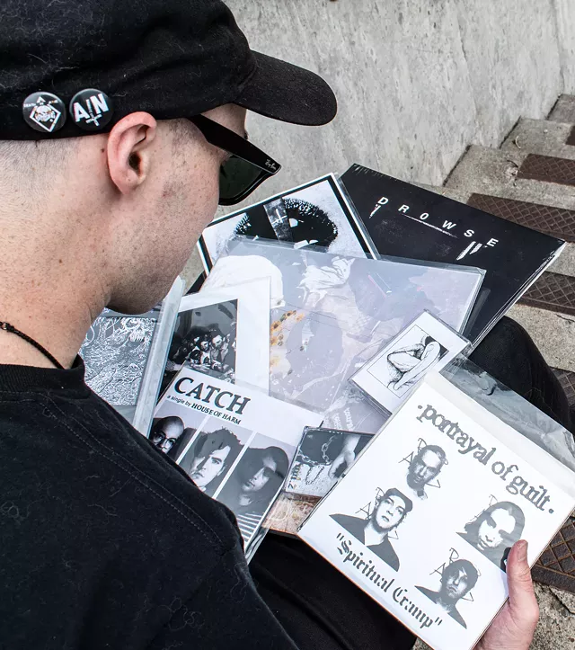 The Rochester record label Sore Ear Collective releases music on CD, vinyl, cassette, and even VHS tape. - PHOTO BY JACOB WALSH