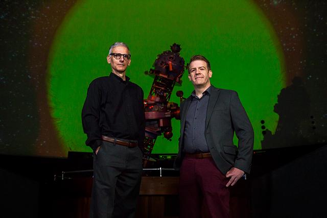 The creative team behind "Impressions of the Infinte": Strasenburgh Planetarium Director Steve Fentress and Ian Sherman of the funk fusion band Vanishing Sun. - PHOTO BY DAVE JONES