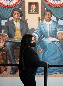 Michelle Daniels explained that the man whose portrait is situated between Frederick and Anna Murray Douglass is Gerrit Smith, a philanthropist and abolitionist who provided substantial financial support for The North Star. - PHOTO BY JACOB WALSH