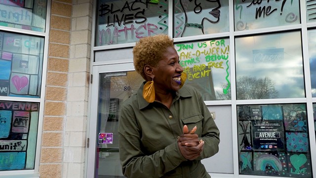 Reenah Golden stands outside of the Avenue Blackbox Theatre, which she founded. - PHOTO BY KATIE EPNER