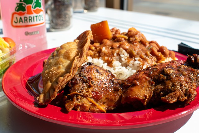 Me Gusta's lunch menu includes such inexpensive options as the $10 lunch platter, which includes the Famous Jerk Chicken, rice and beans, and vegetables. Add a beef empanada for $3. - PHOTO BY JACOB WALSH