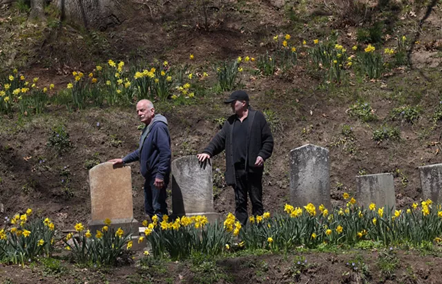 Bill Whitney, left, and Mykel Whitney survey their handiwork in "The Kettle" of Mount Hope Cemetery. - PHOTO BY MAX SCHULTE