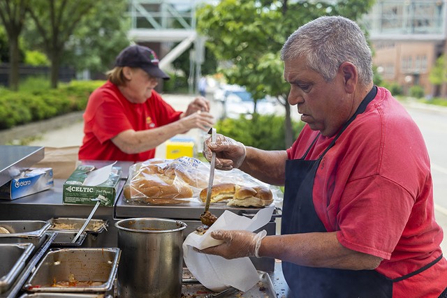 Dave and Sue Miran, who will have been married for 40 years in 2022, have been a beloved "street meat" vending team for decades in downtown Rochester. They have been at the corner of St. Mary's Place and Court Street since 2000. - PHOTO BY LAUREN PETRACCA
