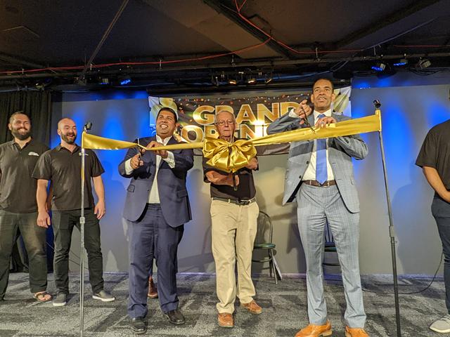 New York State Senator Jeremy Cooney, Roger Sutphen, and Rochester Mayor Malik Evans cut the ribbon at the opening of The Focus Theater at the Sibley Building on Sept. 9, 2022. - PHOTO BY DANIEL J. KUSHNER