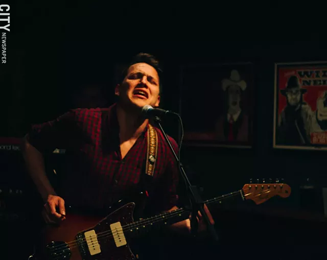 Guitarist Sean Greif during a show at Abilene Bar and Lounge. - PHOTO BY KEVIN FULLER