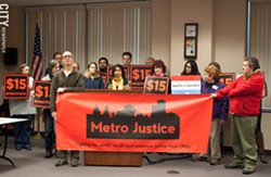 Mohini Sharma, organizer at Metro Justice, speaks during a press conference on a Trump administration proposal affecting workers' tips. - PHOTO BY JACOB WALSH