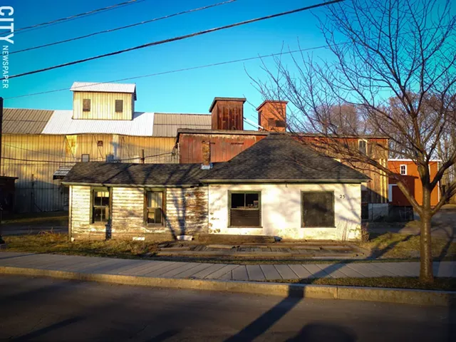 Wilmorite has temporarily withdrawn plans to redevelop 25 Schoen Place in the Village of Pittsford. The property is located in the village’s popular canalfront business district. - FILE PHOTO