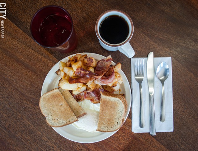 Two eggs over-easy, rye toast, bacon, and home fries at Pat's Coffee Mug. - PHOTO BY JACOB WALSH