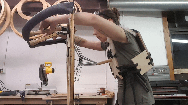 Sculptor Annalisa Barron demonstrates the motion of the monster prototype base. - PHOTO PROVIDED