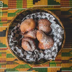 Bofrot (puff puff) is a sweet pastry on the menu at Akwaaba. - PHOTO BY RYAN WILLIAMSON