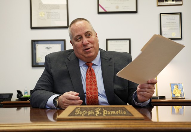 Defense attorney Joe Damelio in his office in the First Federal Building in downtown Rochester.