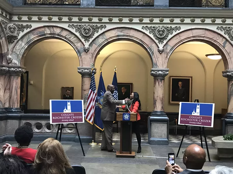 Colgate Rochester Crozer Divinity School President Marvin McMickle and his successor, Angela Sims, at a City Hall press conference announcing Sims' appointment. - PHOTO BY CAITLIN WHYTE, WXXI
