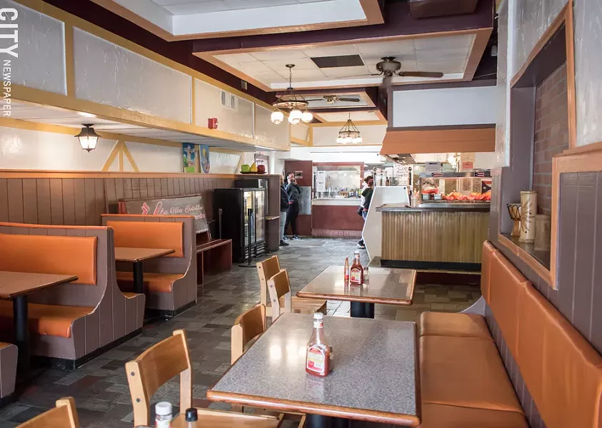Owner Javier Gonzalez opened La Olla Criolla in what used to be a neighborhood bar, and did much of the renovating himself. - PHOTO BY JACOB WALSH
