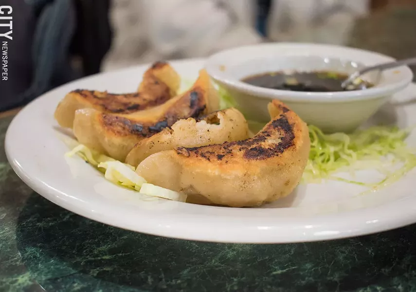The pork gyoza, or pot-stickers made with pumpkin pulp wrappers. - PHOTO BY JACOB WALSH