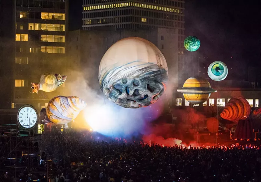 French street theater troupe Plasticiens Volants amazed crowds in 2017 with its immersive "Big Bang" show at Parcel 5. The group returns to Rochester this year with a new presentation on Friday and Saturday on the Fringe, September 13-14. - PHOTO BY JOHN SCHLIA