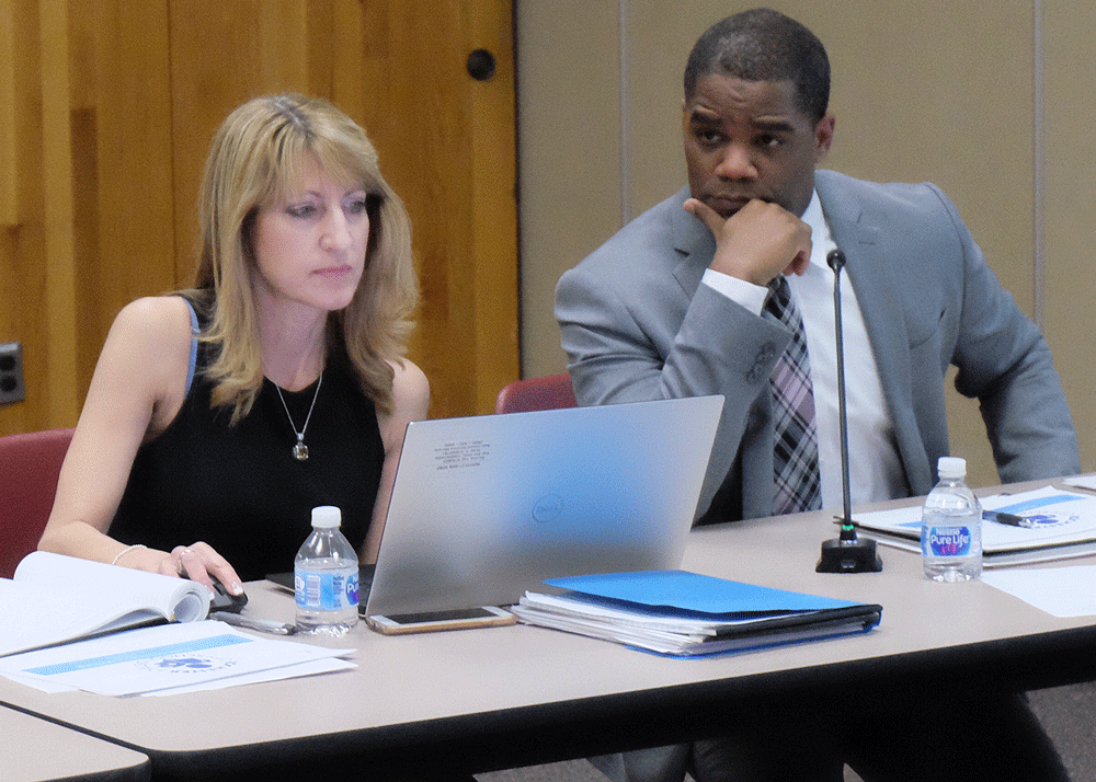 Rochester Superintendent Terry Dade, with his chief of staff, Annmarie Lehner, at Tuesday's school board meeting. - PHOTO BY JAMES BROWN, WXXI NEWS
