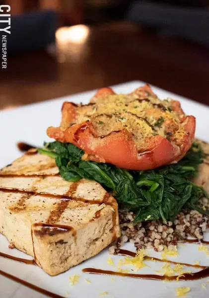 For the vegetarians, the Monticello is grilled tofu, and roasted heirloom tomatoes topped with balsamic glaze. - PHOTO BY JACOB WALSH
