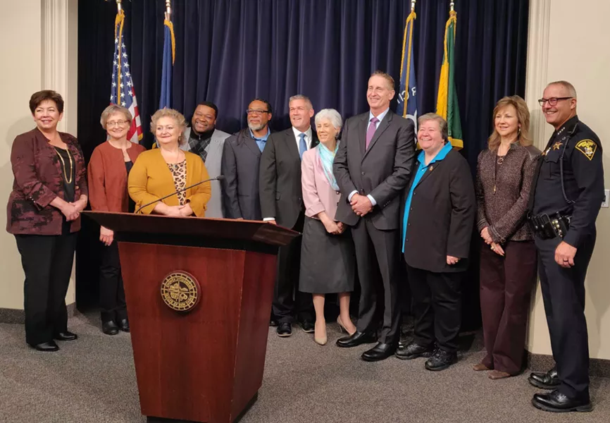 County Executive-elect Adam Bello, a Democrat, with members of his transition committee. - PHOTO BY JEREMY MOULE