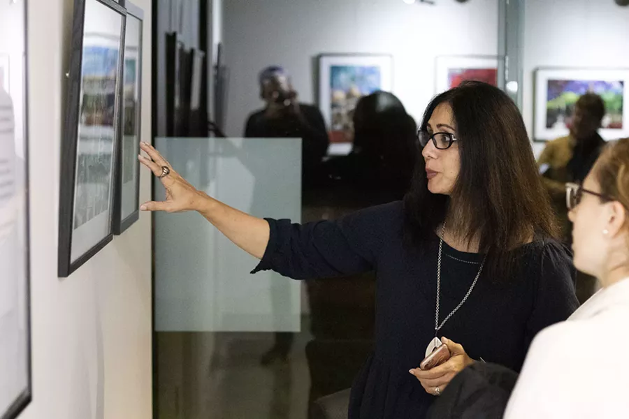 Artist and filmmaker Mara Ahmed discusses her work in "This Heirloom," a "Current Seen" exhibition curated by Amanda Chestnut at the Douglass Auditorium. - PHOTO BY QUAJAY DONNELL