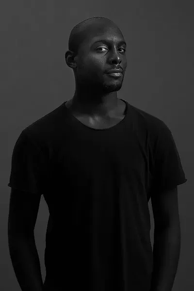 Jiréh Breon Holder sat for a portrait by McFadden and answered prompts about the concepts of manhood and freedom. - PHOTO BY JOSHUA MCFADDEN