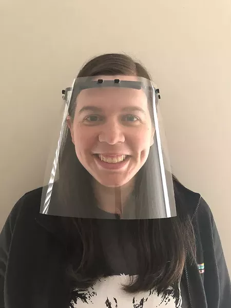 Katie Pastene, a nurse practitioner, shows one of the face shields made through the efforts of her wife, Coty Pastene. - PHOTO PROVIDED
