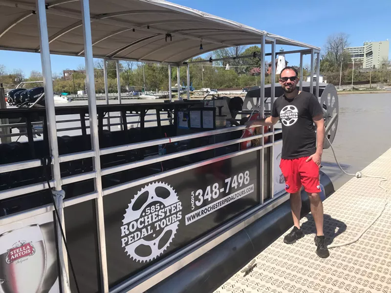 Phil Szal, owner of Rochester Pedal Tours, with his pedal boat. - PHOTO BY DAVID ANDREATTA