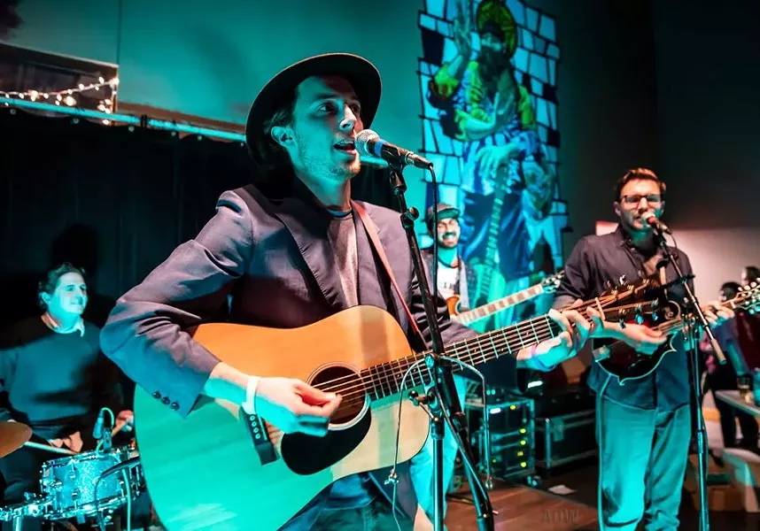Ray Mahar (forefront) leading A Girl Named Genny at a Three Heads Brewing Gig in 2018. - PHOTO BY AARON WINTERS