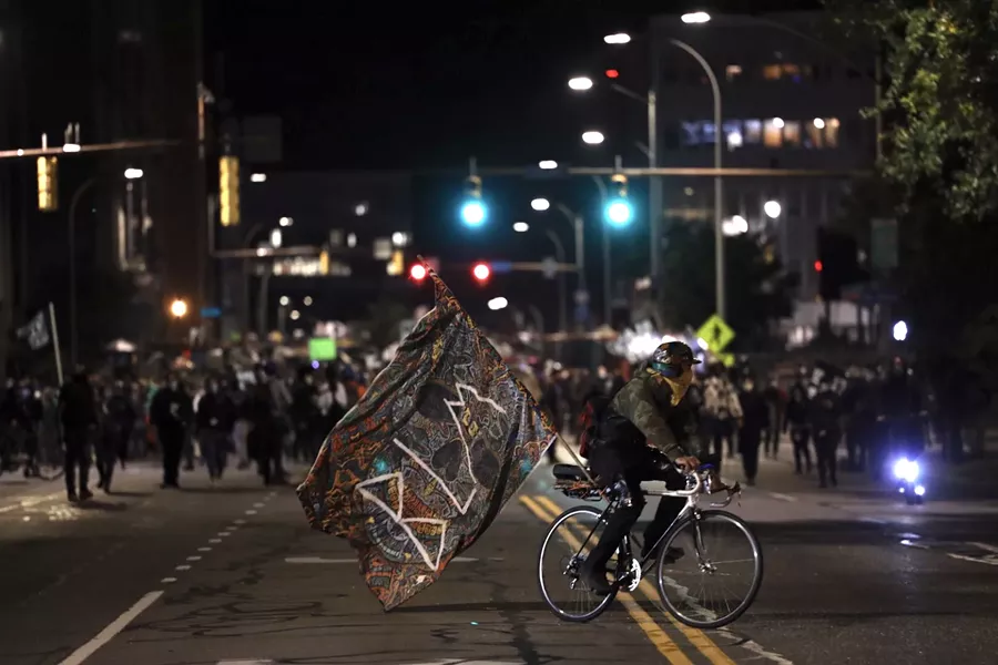 Demonstrators march toward the Public Safety Building on Sunday, Sept. 6, 2020. - PHOTO BY MAX SCHULTE