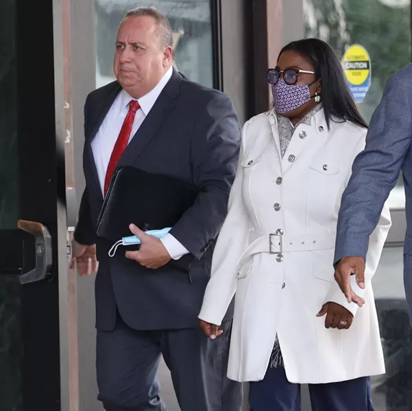 Defense attorney Joe Damelio accompanies his client, Mayor Lovely Warren, to court for her arraignment in October 2020. - PHOTO BY MAX SCHULTE