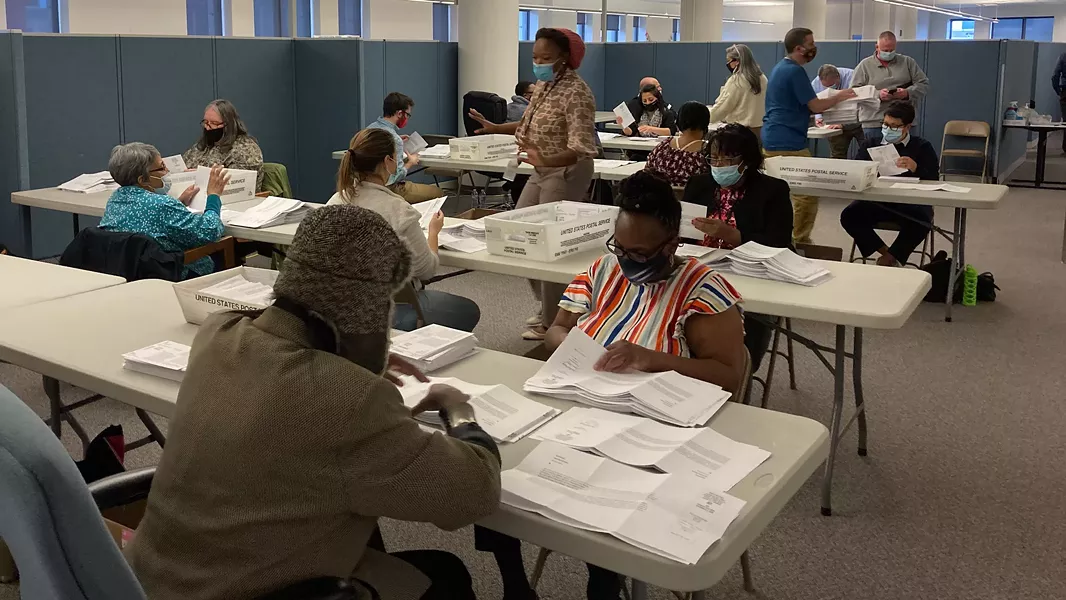 Board of Elections workers began counting ballots at 10 a.m. on Monday, Nov. 16. - PHOTO BY JEREMY MOULE
