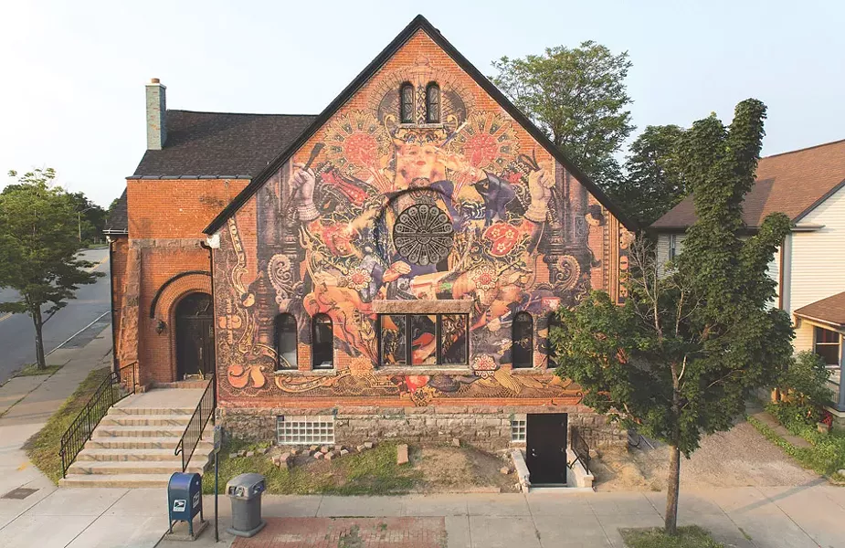 Amsterdam-based artist Handiedan installed a massive wheatpaste mural for WALL\THERAPY over the holiday weekend at 820 South Clinton Avenue. The 2015 mural festival takes place July 17 through 26, with a theme of surrealism and the fantastic. - PHOTO BY MARK DEFF