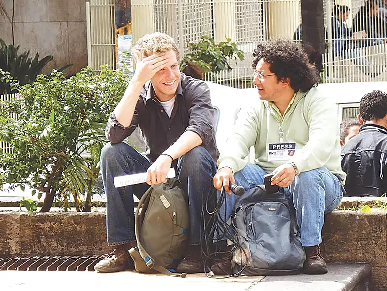 Canadian documentary filmmaker Jesse Freeston (left) discusses projects with Honduran radio host and producer Félix Molina. - PHOTO PROVIDED