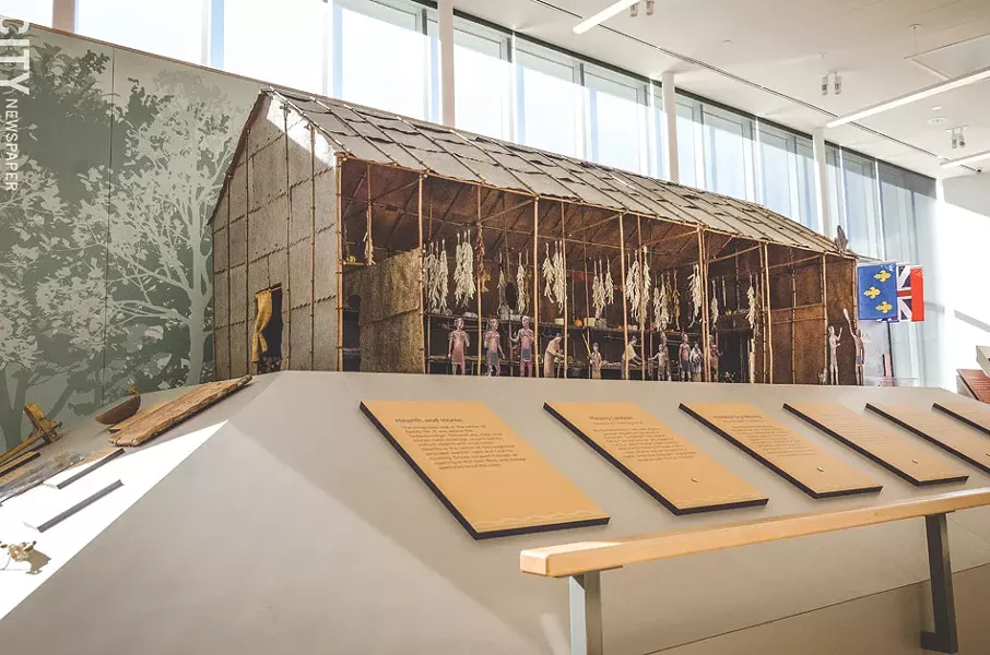 A model of Ganondagan's longhouse in the SACC gallery space. - PHOTO BY MARK CHAMBERLIN