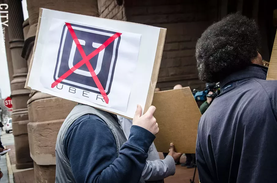 Cab drivers say that Uber will take their jobs. - PHOTO BY MARK CHAMBERLIN