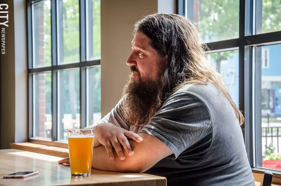Co-owner Geoff Dale discussed the new base of operations, which includes the tasting room, production floor, and patio. - PHOTO BY MARK CHAMBERLIN