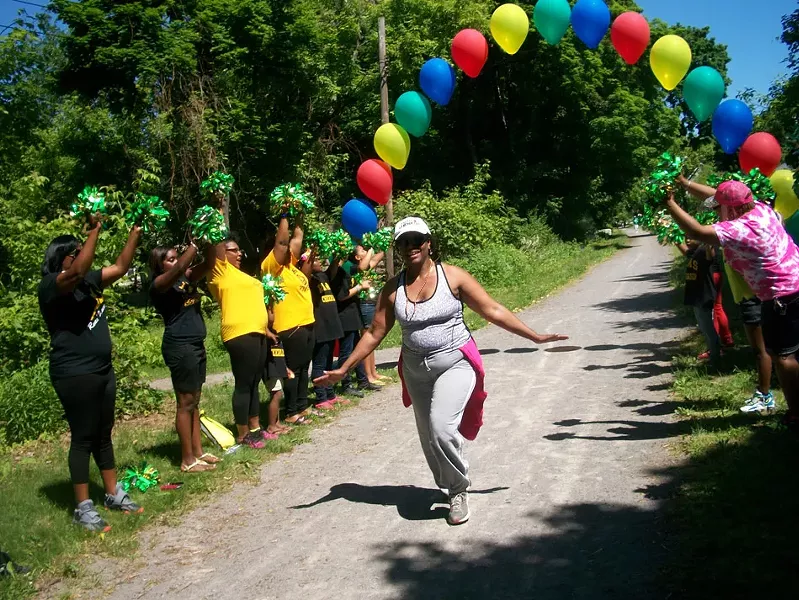 A runner crosses the finish line in a 5K run on El Camino Trail in the city's northeast. - PROVIDED PHOTO