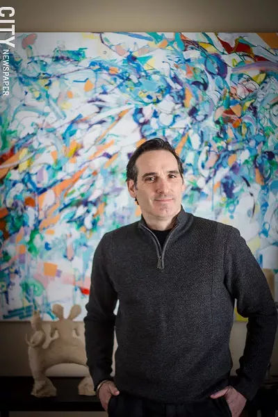 James Tabbi, at home with his Nate Hodge painting. - PHOTO BY KEVIN FULLER