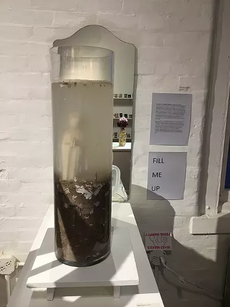 Rex's ephemeral sculpture, "We're 2 Solid, U and I," post-disintegration. - PHOTO PROVIDED
