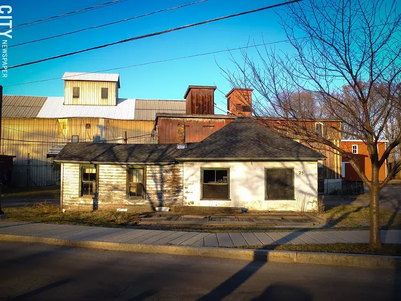 Wilmorite has temporarily withdrawn plans to redevelop 25 Schoen Place in the Village of Pittsford. The property is located in the village’s popular canalfront business district. - FILE PHOTO