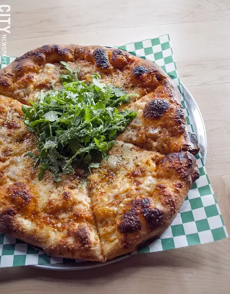On The Swan Dive's pizza menu: the Big Pink. - PHOTO BY RENÉE HEININGER