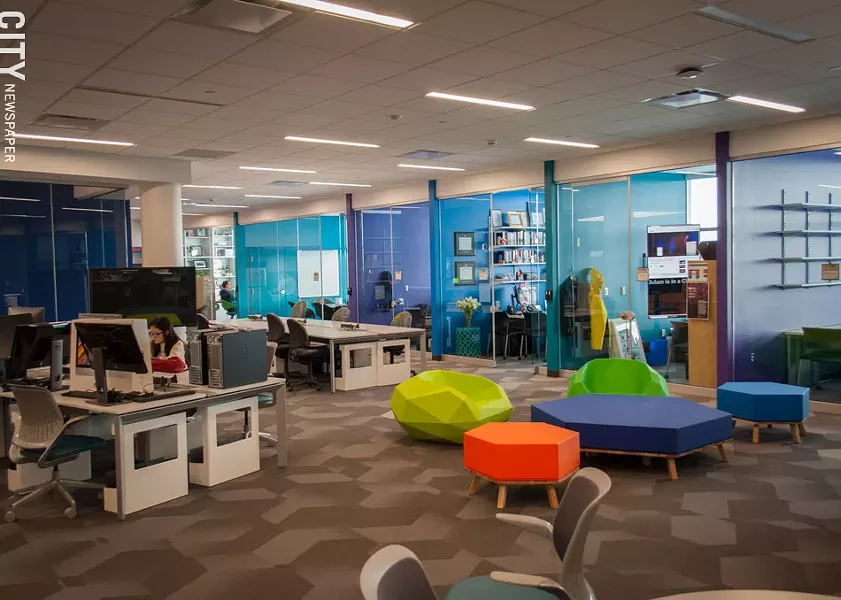 In the upper level of the MAGIC Center, students collaborate with RIT faculty and MAGIC staff in the Innovation Suite. - PHOTO BY RYAN WILLIAMSON