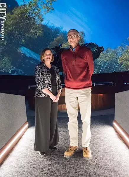 RMSC president and CEO Hillary Olson and Strasenburgh Planetarium director Steve Fentress in Star Theater. - PHOTO BY JACOB WALSH