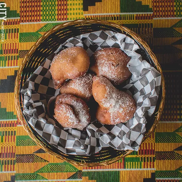 Bofrot (puff puff) is a sweet pastry on the menu at Akwaaba. - PHOTO BY RYAN WILLIAMSON