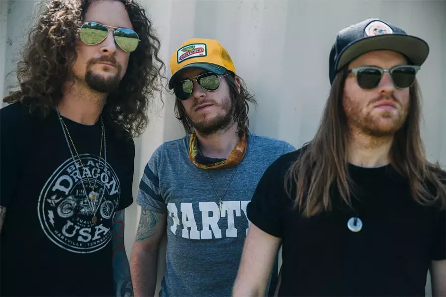 The Cadillac Three — (left to right) lap steel player Kelby Ray, singer-guitarist Jaren Johnston, and drummer Neil Mason — resonates with country and rock 'n' roll in equal parts. - PHOTO PROVIDED