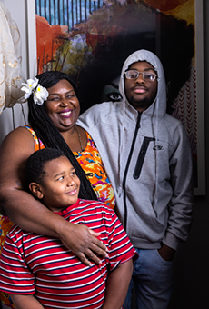 Sparkle, 44, in her home with sons Jakai, 17, and Christian, 7.