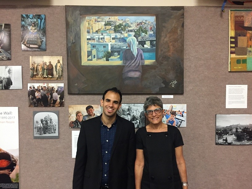 Bshara Nassar and Mary Panzer, co-curators of "Bethlehem Beyond the Wall," an exhibit of the Museum of the Palestinian People currently installed at Nazareth College. - PHOTO BY KURT INDOVINA