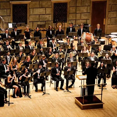 Eastman Wind Orchestra. Mark Davis Scatterday, conductor and Mason St. Pierre, doctoral conducting assistant